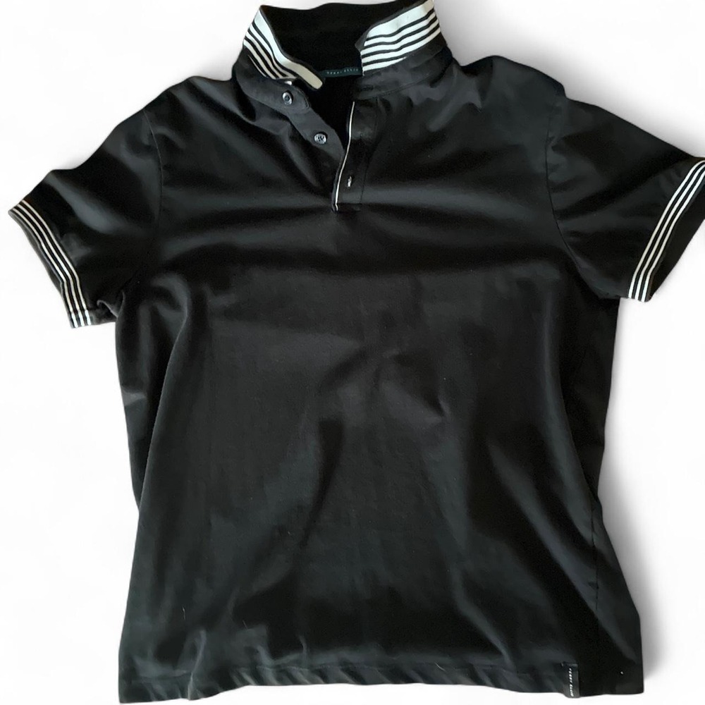 Black Perry Ellis polo shirt with white stripes on collar and sleeve cuffs. M